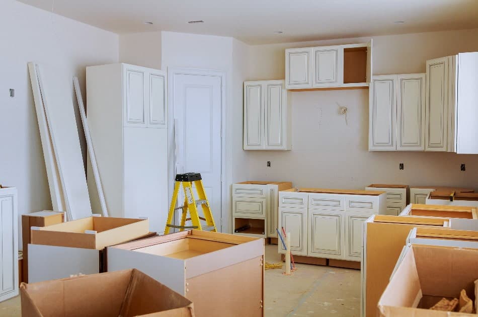 custom kitchen cabinets in various stages of installation