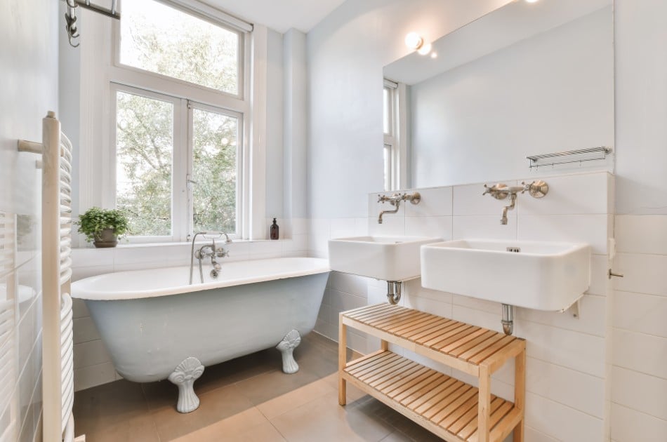 Elegant white design of bathroom interior with modern sinks