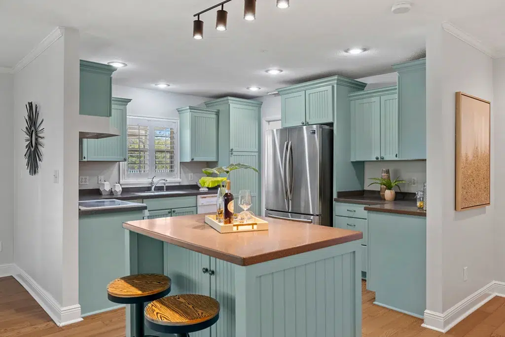 kitchen that has more sage green accents